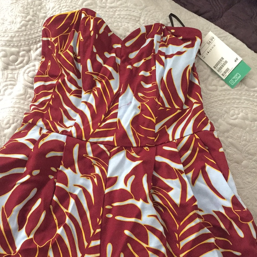 Maroon and gold sleeveless jumper